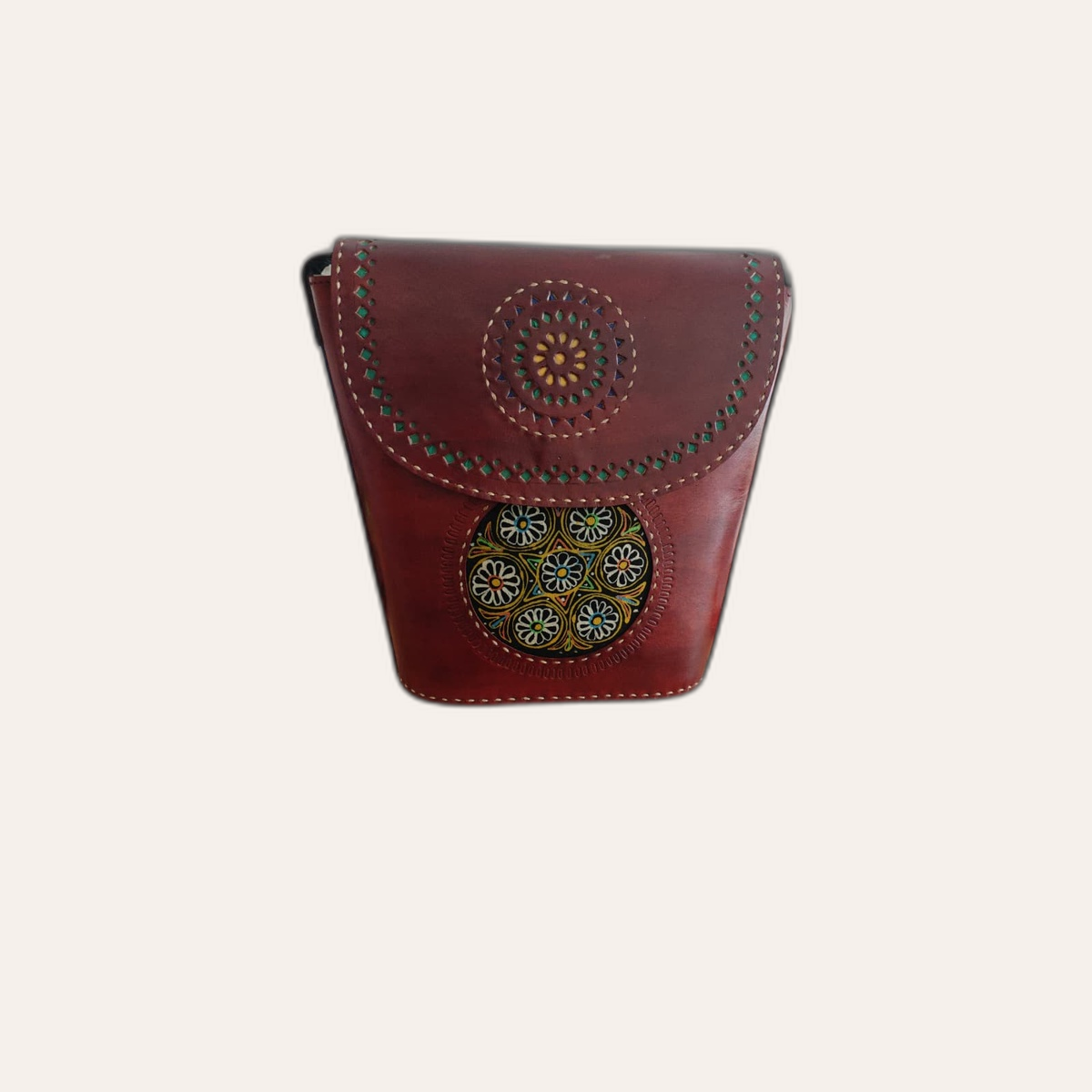 N.01 structured camel leather top-handle bag on Nirové ivory background